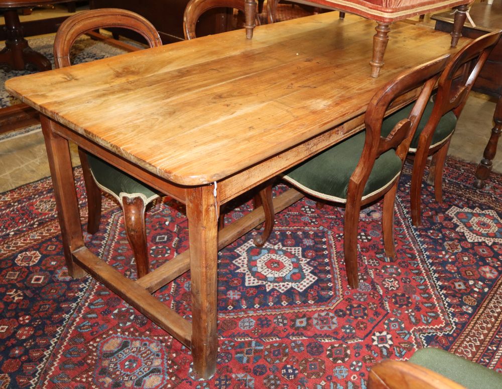 A 19th century French cherrywood farmhouse kitchen table with one side drawer, W.188cm, D.85cm, H.74cm